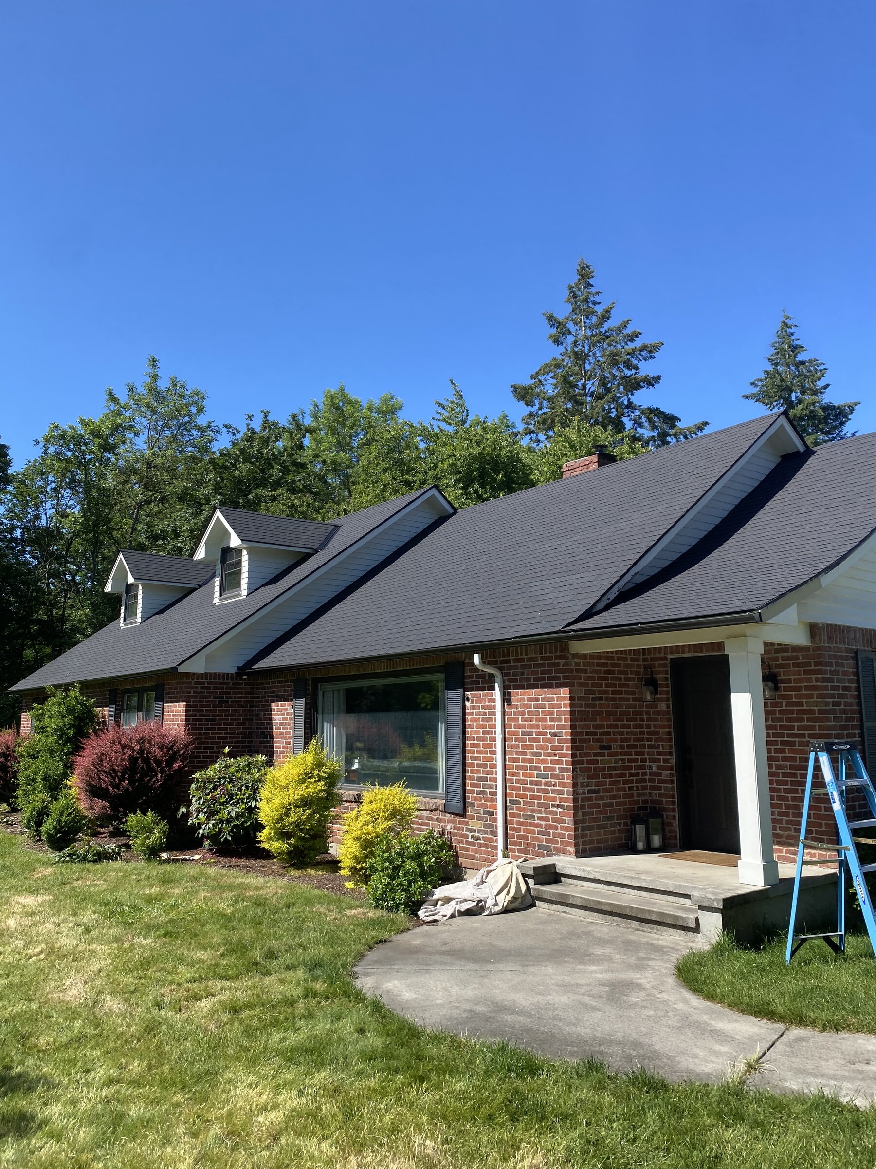 Brick ranch home with new architectural shingle roof