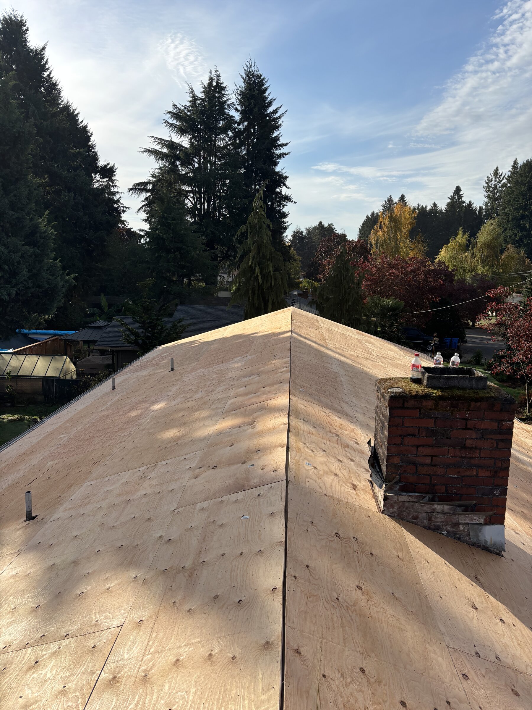 Roof sheathing replacement in progress