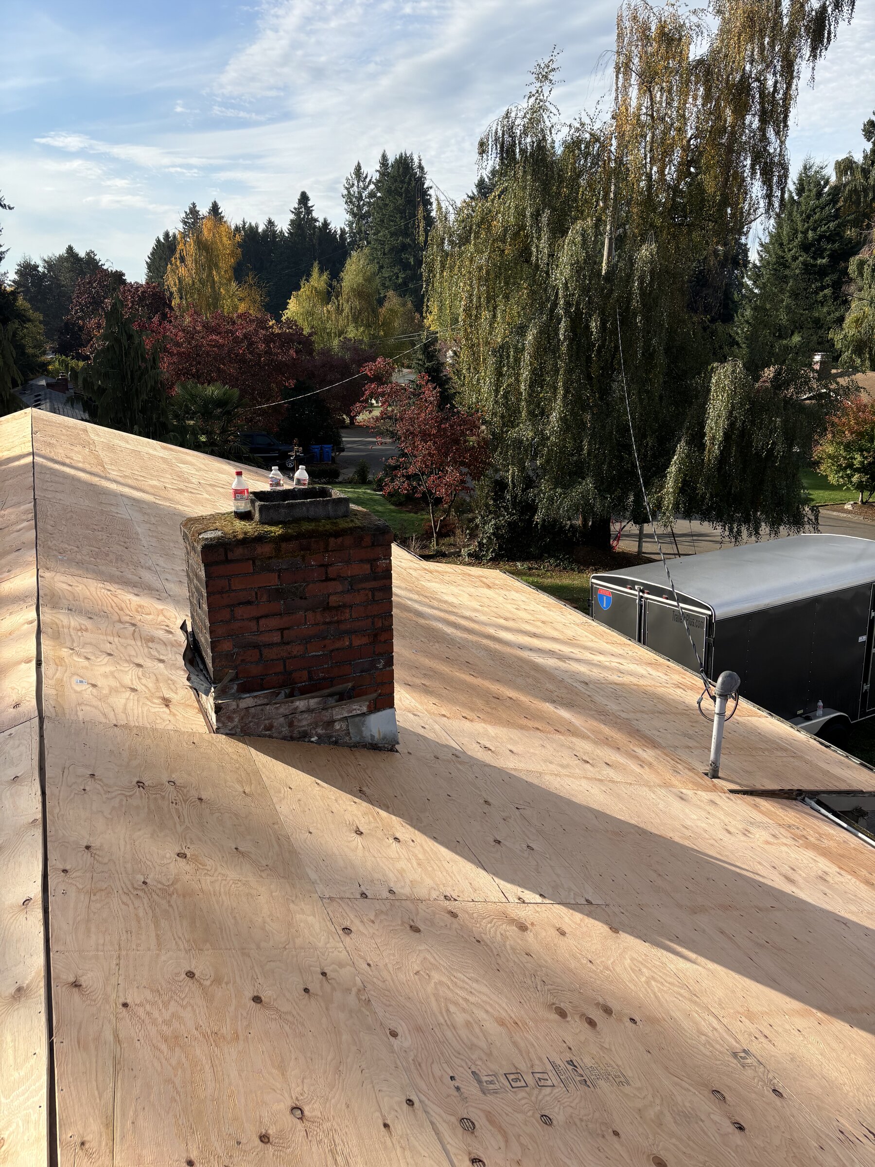 New roof decking and sheathing installed before shingles